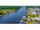 An aerial view showcases condos with piers and dock space along a wide river at 222 Landing Rd. # 1811, North Myrtle Beach, SC 29582