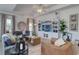 Bright and airy living room featuring stylish furniture and a decorative ceiling fan at 227 Sundrop Way, Conway, SC 29526