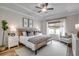 Bedroom features a ceiling fan, beautiful window view and neutral decor at 227 Sundrop Way, Conway, SC 29526