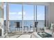 Balcony with ocean view has chairs and a table for relaxing at 2500 N Ocean Blvd. # Ph 1, Myrtle Beach, SC 29577