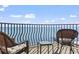 Breathtaking ocean view from the balcony featuring wicker seating at 2500 N Ocean Blvd. # Ph 1, Myrtle Beach, SC 29577