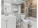 Well-lit bathroom featuring a tub-shower combo and a single sink vanity with white cabinets at 2500 N Ocean Blvd. # Ph 1, Myrtle Beach, SC 29577