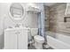 Neat bathroom featuring a modern single sink vanity with a large mirror and a shower-tub combo at 2500 N Ocean Blvd. # Ph 1, Myrtle Beach, SC 29577