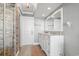 Spacious bathroom featuring a double sink vanity, walk-in shower with tile surround, and neutral color palette at 2500 N Ocean Blvd. # Ph 1, Myrtle Beach, SC 29577