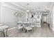 Stylish dining room with seating for six featuring pendant lighting and coastal decor at 2500 N Ocean Blvd. # Ph 1, Myrtle Beach, SC 29577
