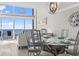 Light and bright dining room with modern light fixtures and ocean views at 2500 N Ocean Blvd. # Ph 1, Myrtle Beach, SC 29577