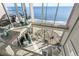 This living room offers soaring ceilings, ocean views, and plenty of space to relax and enjoy the views at 2500 N Ocean Blvd. # Ph 1, Myrtle Beach, SC 29577