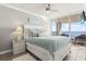 Main bedroom has a ceiling fan and sliding glass door access to the balcony overlooking the ocean at 2500 N Ocean Blvd. # Ph 1, Myrtle Beach, SC 29577