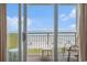 Balcony with chairs offering picturesque ocean and beach views at 2801 S Ocean Blvd. # 535, North Myrtle Beach, SC 29582