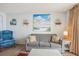 A quaint living room with a coastal-themed painting and comfortable seating at 2801 S Ocean Blvd. # 535, North Myrtle Beach, SC 29582