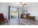 Bright bedroom with large window overlooking the landscape, offering space and natural light at 2981 Victor Rd., Longs, SC 29568