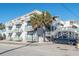 Multi-level condominium building offering balconies, stairwells, and a convenient parking area for residents and guests at 300 47Th Ave. S # 1F, North Myrtle Beach, SC 29582