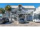 Exterior view of stairwells leading to a condominium, offering multiple levels of access and convenient parking at 300 47Th Ave. S # 1F, North Myrtle Beach, SC 29582