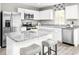 Modern kitchen featuring granite countertops, stainless steel appliances, and a large island at 3210 Nw Edgemead Circle # C, Calabash, NC 28467
