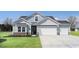 Charming single-Gathering home with a manicured lawn, a two-car garage, and eye-catching curb appeal at 332 Garden Grove St, Conway, SC 29526