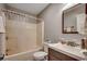 Full bathroom featuring a tub-shower, toilet, vanity and towel rack at 403 Chesterfield Ct., Myrtle Beach, SC 29577