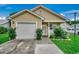 Charming single-story home with attached garage, well-maintained lawn, and lovely curb appeal at 403 Chesterfield Ct., Myrtle Beach, SC 29577