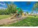 Large playground in a well-maintained, green community park with a variety of equipment at 403 Chesterfield Ct., Myrtle Beach, SC 29577
