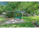 Enjoy the outdoors on this swing bench nestled among mature trees and landscaping at 403 Chesterfield Ct., Myrtle Beach, SC 29577