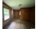 Empty room with linoleum flooring and window at 41 Harmon St., Hemingway, SC 29554