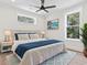 Comfortable bedroom featuring a large bed with stylish bedding and bedside tables with lamps at 4617 Hedrick St., North Myrtle Beach, SC 29582