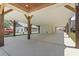 Expansive covered carport provides ample parking and shade, with elegant wood beams and a well-lit area at 4617 Hedrick St., North Myrtle Beach, SC 29582