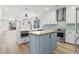 Well-equipped kitchen with modern appliances, white cabinets, butcher block island, and stylish backsplash at 4617 Hedrick St., North Myrtle Beach, SC 29582