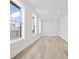 Bright living room with recessed lighting, wood floors, and large windows offering natural light and views at 4617 Hedrick St., North Myrtle Beach, SC 29582
