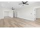 Spacious living room featuring recessed lighting, two ceiling fans and wood flooring throughout the space at 4617 Hedrick St., North Myrtle Beach, SC 29582