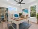 Lovely home office with luxury vinyl flooring, and a large window allowing for natural light at 4617 Hedrick St., North Myrtle Beach, SC 29582