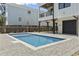 Lovely pool and outdoor area with a modern home exterior, set against lush green landscaping at 4617 Hedrick St., North Myrtle Beach, SC 29582