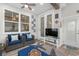 Cozy sunroom with coastal-themed decor, wicker furniture, and lots of natural light at 462 Pacific Commons Dr., Surfside Beach, SC 29575