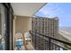 Balcony with seating and stunning ocean views of the beach and high-rise condo at 4800 S Ocean Blvd. # 1221, North Myrtle Beach, SC 29582
