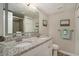 Bathroom featuring a granite countertop, double sinks, walk-in shower, and beach house decor at 4800 S Ocean Blvd. # 1221, North Myrtle Beach, SC 29582