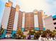 Exterior shot of condo building with beach access and ocean views at 4800 S Ocean Blvd. # 1221, North Myrtle Beach, SC 29582