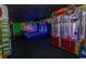Well-lit game room featuring a variety of modern arcade games for entertainment at 4800 S Ocean Blvd. # 1221, North Myrtle Beach, SC 29582