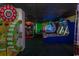 Spacious game room offering various arcade games and machines at 4800 S Ocean Blvd. # 1221, North Myrtle Beach, SC 29582