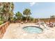 Secluded outdoor hot tub surrounded by lush landscaping, offering a private and relaxing spa experience at 4800 S Ocean Blvd. # 1221, North Myrtle Beach, SC 29582