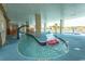 Lazy river featuring shallow water and colorful lifeguard themed decor at 4800 S Ocean Blvd. # 1221, North Myrtle Beach, SC 29582