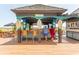 Breezes Pool Bar and Grill with surfboard decor, perfect for refreshments and casual dining at 4800 S Ocean Blvd. # 1221, North Myrtle Beach, SC 29582