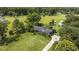 Birds eye view of home featuring an expansive lawn and mature trees, showcasing privacy at 4860 Highway 378, Conway, SC 29527