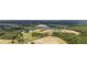 Aerial view of the property showcasing farmland, ponds and lush greenery at 4860 Highway 378, Conway, SC 29527