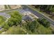 Aerial view of the dilapidated building with the surrounding trees, grass and cracked driveway at 4860 Highway 378, Conway, SC 29527