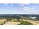 Lush, scenic landscape with a home, ponds, and idyllic farmland visible from above at 4860 Highway 378, Conway, SC 29527