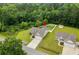 Aerial view of a landscaped homesite featuring mature trees and a fence line at 5115 Huston Rd., Conway, SC 29526