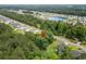 Aerial view of a wooded homesite in a Primary planned community with pond and mature trees at 5115 Huston Rd., Conway, SC 29526
