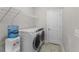 Laundry room equipped with a washer, a dryer, and shelving to maximize space at 5115 Huston Rd., Conway, SC 29526