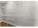 Spacious walk-in closet featuring built-in white wire shelving for ample storage at 5115 Huston Rd., Conway, SC 29526