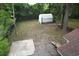 Large backyard features mature trees and a storage shed at 514 Palm St., Georgetown, SC 29440
