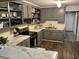 Well-equipped kitchen featuring modern appliances, bright marble countertops, and ample cabinet space at 514 Palm St., Georgetown, SC 29440